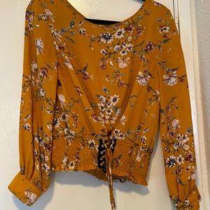 Mustard blouse with flowers